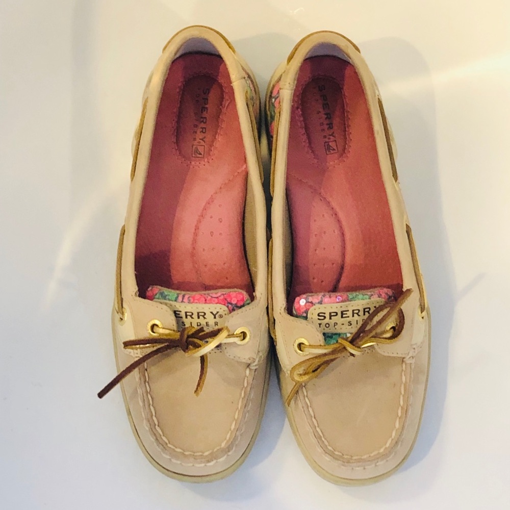 Floral sequin Sperry deck shoes.